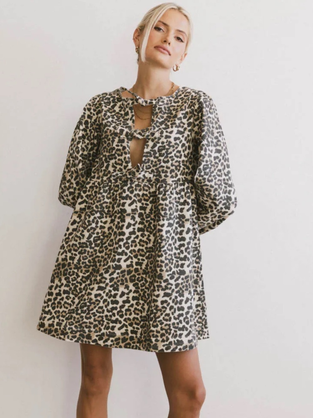 Tyler Peplum Mini Dress in Leopard